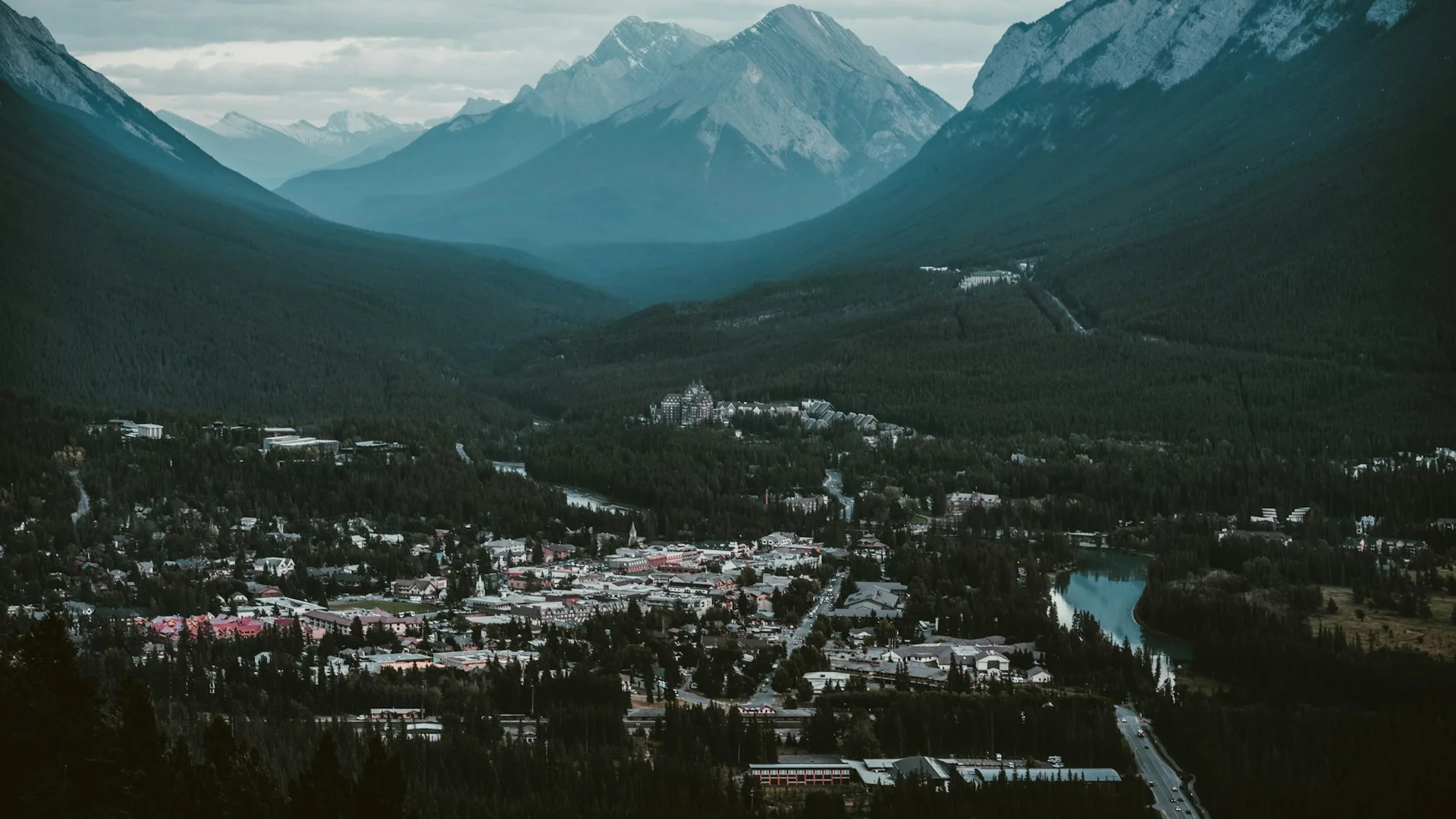 Signal Hill ridge at dusk with the Rocky Mountains visible in the background